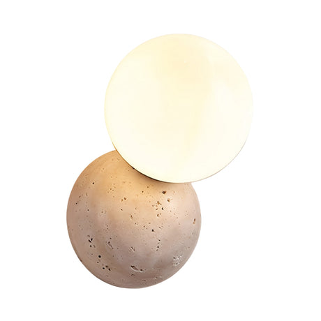 The Belaro 1 Light Globe Travertine Wall Light in light beige features a round, white frosted glass shade atop a textured travertine sphere, providing a modern accent against a white background.