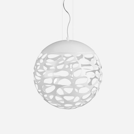 The Elon LED Light Pendant in matte white, featuring a spherical shape and an abstract openwork design, hangs from the ceiling. Its intricate pattern provides ambient lighting that enhances a modern and artistic look against a plain white backdrop.