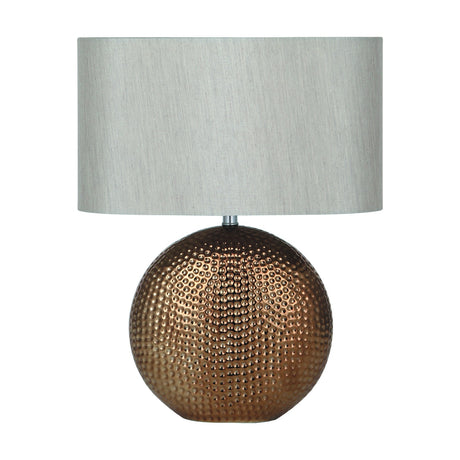 Mabel Bronze Dot Textured Ceramic Table Lamp, 40cm, with a round dimpled bronze ceramic base and oval light grey fabric shade, shown on a plain white background.