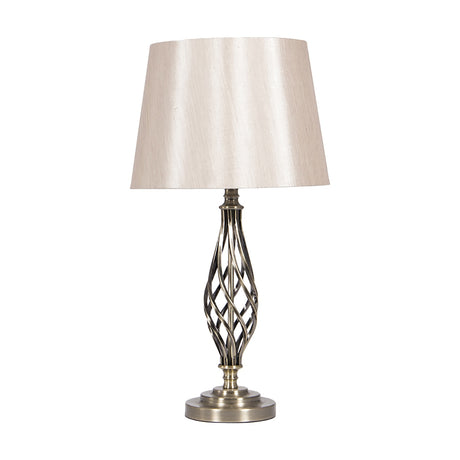 Jenna table lamp, 58cm, with an antique brass twisted spiral base and round foot, topped by a cream tapered fabric shade, shown on a plain white background.