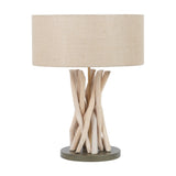 Derna Driftwood Table Lamp, 51cm, with a natural jute drum shade atop a criss-crossed natural wood branch base on a round dark stand, shown on a plain white background.