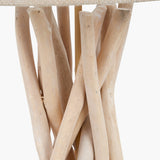 Close-up of the Derna Table Lamp's base, showing bundled natural driftwood legs with a light, weathered wood finish against a plain white background.