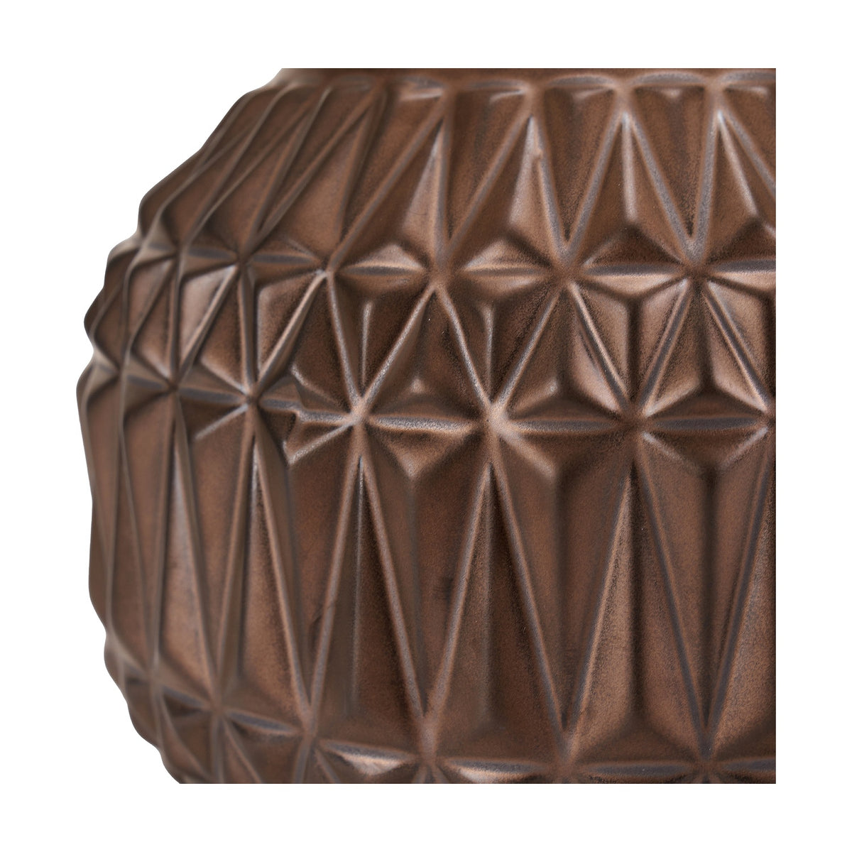 Close-up of the Anneli Bronze Aztec Texture Ceramic Table Lamp base, showing a geometric triangular pattern moulded into the bronze ceramic surface.
