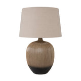Greta Brown & Black Textured Ceramic Table Lamp, 50cm, with ridged brown base fading to black and a tapered natural linen shade, on a plain white background.