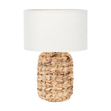 Zadi Natural Plaited Tall Water Hyacinth Table Lamp, 50cm, with a woven jute-toned base and a plain white drum shade, shown on a white background.