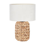 Zadi Natural Plaited Tall Water Hyacinth Table Lamp, 50cm, with braided natural wicker base and white drum shade, shown on a plain white background.