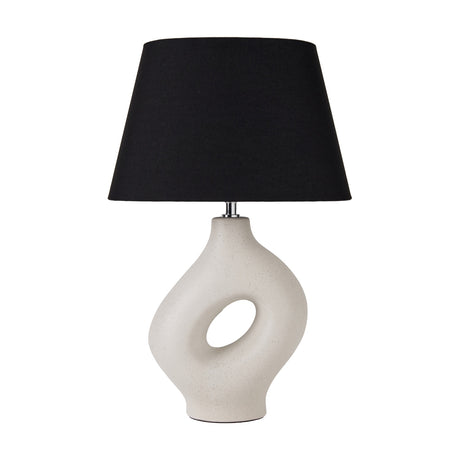 Ulla Monochrome Cream Organic Ceramic Table Lamp, 51cm, with sculptural cut-out cream ceramic base and black tapered fabric shade, on a plain white background.