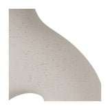 Close-up of the Ulla Monochrome Cream Organic Ceramic Table Lamp base showing its curved, speckled cream ceramic surface and organic wave-like silhouette against a white background.