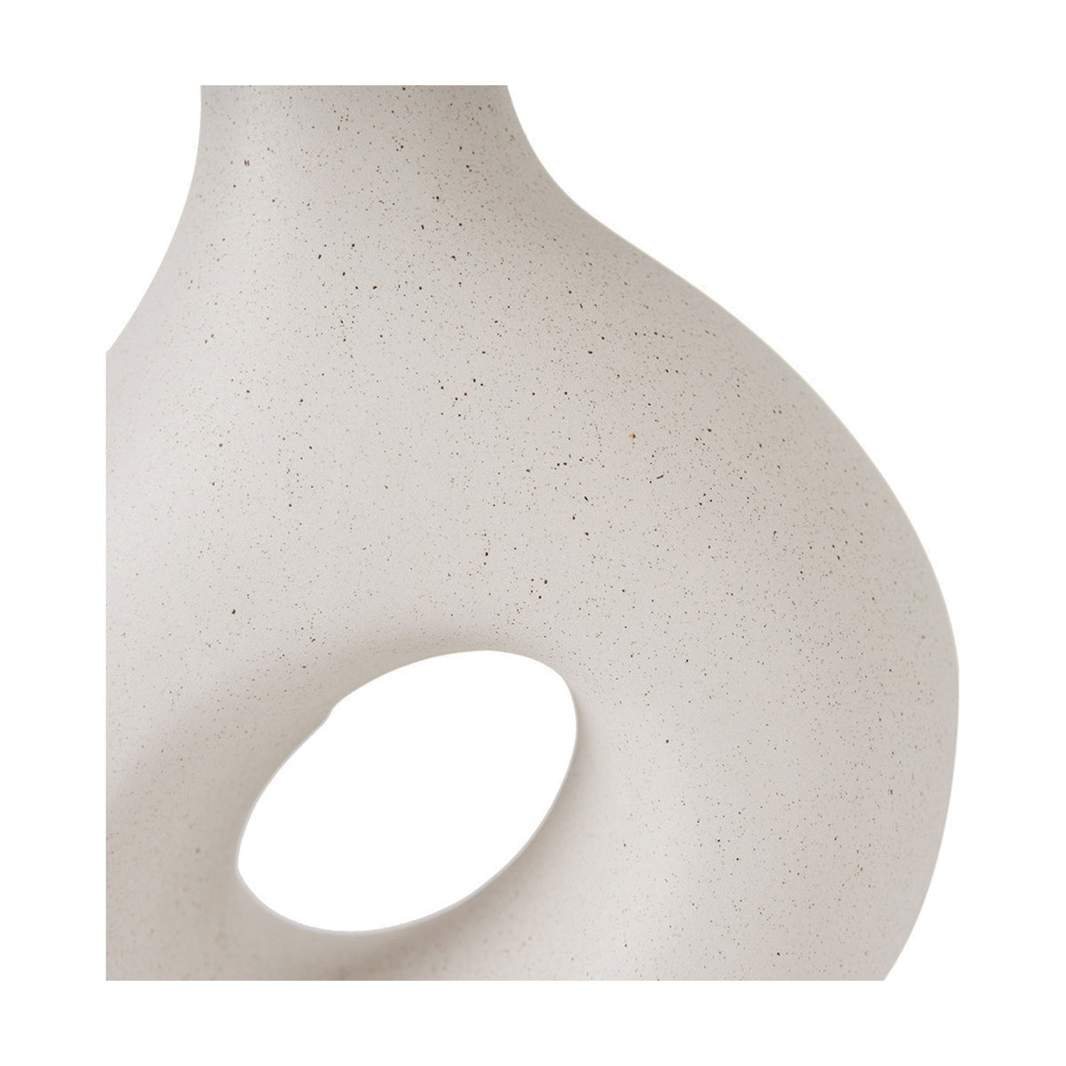 Close-up of the Ulla Monochrome Cream Organic Ceramic Table Lamp base showing its speckled cream finish and organic cut-out detail against a plain white background.
