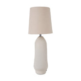 Laila Natural Beige Organic Tall Ceramic Table Lamp, 56cm, with a speckled beige ceramic base and tapered linen shade, shown on a plain white background.