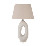 Laila Natural Beige Organic Tall Ceramic Table Lamp, 56cm, with a speckled cream ceramic base featuring an open oval cut-out and a tapered linen shade, shown on a plain white background.