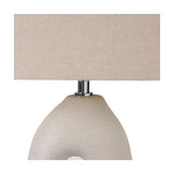 Close-up of the Laila Natural Beige Organic Tall Ceramic Table Lamp showing its speckled beige ceramic base, chrome neck fitting, and rectangular linen shade on a plain white background.
