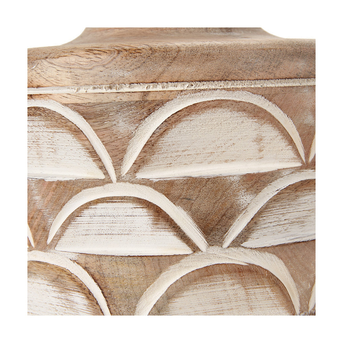 Close-up of the Kingsbury table lamp base showing carved wood scalloped fan pattern with white wash finish on a plain background.