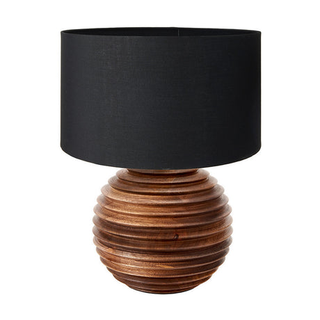 Pembury table lamp with a ribbed, brown wash turned wood base and a black cotton mix drum shade, shown on a plain white background.