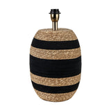 Kalutara table lamp base, 43cm tall, with a barrel-shaped seagrass body in alternating black and natural stripes and a brass-toned bulb fitting, shown against a plain white background.