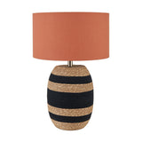 Kalutara Table Lamp with black and natural sea grass striped base and terracotta drum shade, shown on a plain white background.