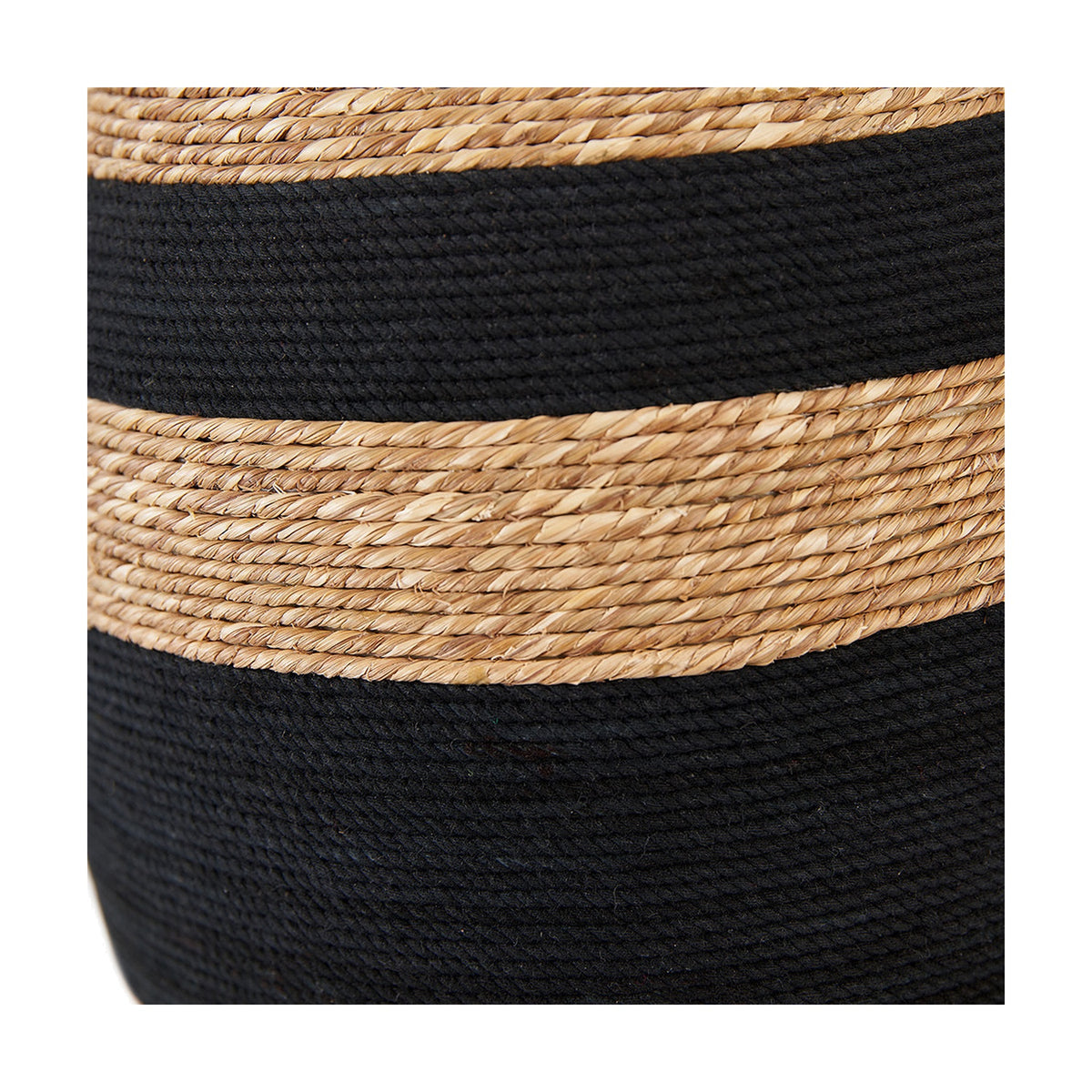 Close-up of the Kalutara Table Lamp Base showing woven natural sea grass bands over a black cotton-wrapped body, highlighting the textured Scandinavian-style finish.