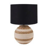 Talalla table lamp with a round beige and natural sea grass striped base, black drum shade, on a plain white background.
