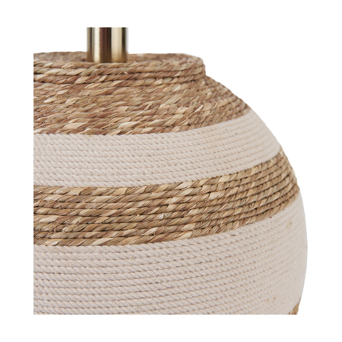 Close-up of the Talalla table lamp base, 25cm, showing woven sea grass texture in natural and beige stripes with brass fitting, on a white background.