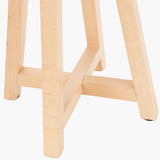 Close-up of the Whitby Wood Tapered 4 Post Table Lamp Base in natural beech, showing four tapered legs joined by cross stretchers, on a plain white background.