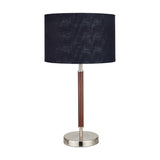Gianni table lamp, 57cm, with a brushed silver metal base and wood-effect stem, paired with a navy fabric drum shade, on a plain white background.