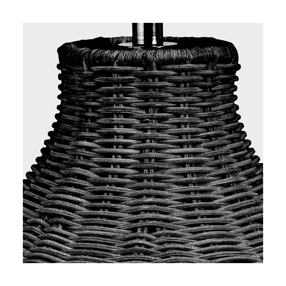 Close-up of the Allona Black Rattan Table Lamp base, showing tightly woven black rattan and a chrome-finished stem against a plain white background.