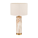 Carrara Stone Effect Ceramic Tall Table Lamp, 55cm, with a marbled cylindrical base in cream and brown tones, brass fittings, and a natural linen drum shade on a plain white background.