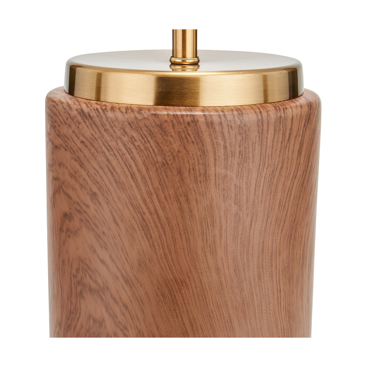 Close-up of the Carrara Wood Effect Ceramic Table Lamp base, showing a cylindrical wood-effect ceramic body with a brushed brass collar and finial on a plain white background.