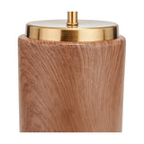 Close-up of the Carrara Wood Effect Ceramic Table Lamp base, showing a cylindrical wood-effect ceramic body with a brushed brass collar and finial on a plain white background.