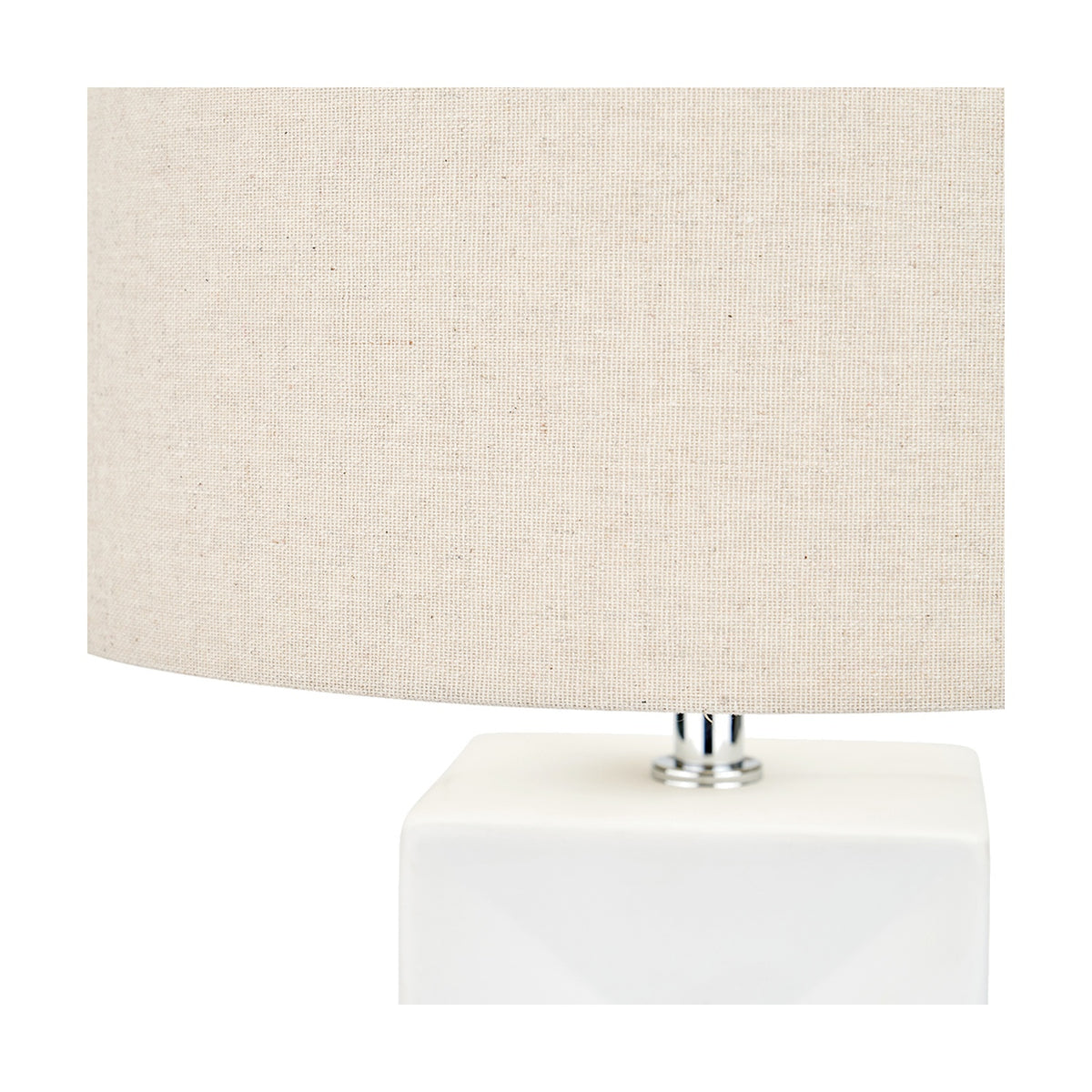 Close-up of the Block White Ceramic Tall Table Lamp, 58cm, showing a square white ceramic base, chrome fitting, and neutral linen drum shade on a plain background.