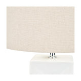 Close-up of the Block White Ceramic Tall Table Lamp, 58cm, showing a square white ceramic base, chrome fitting, and neutral linen drum shade on a plain background.