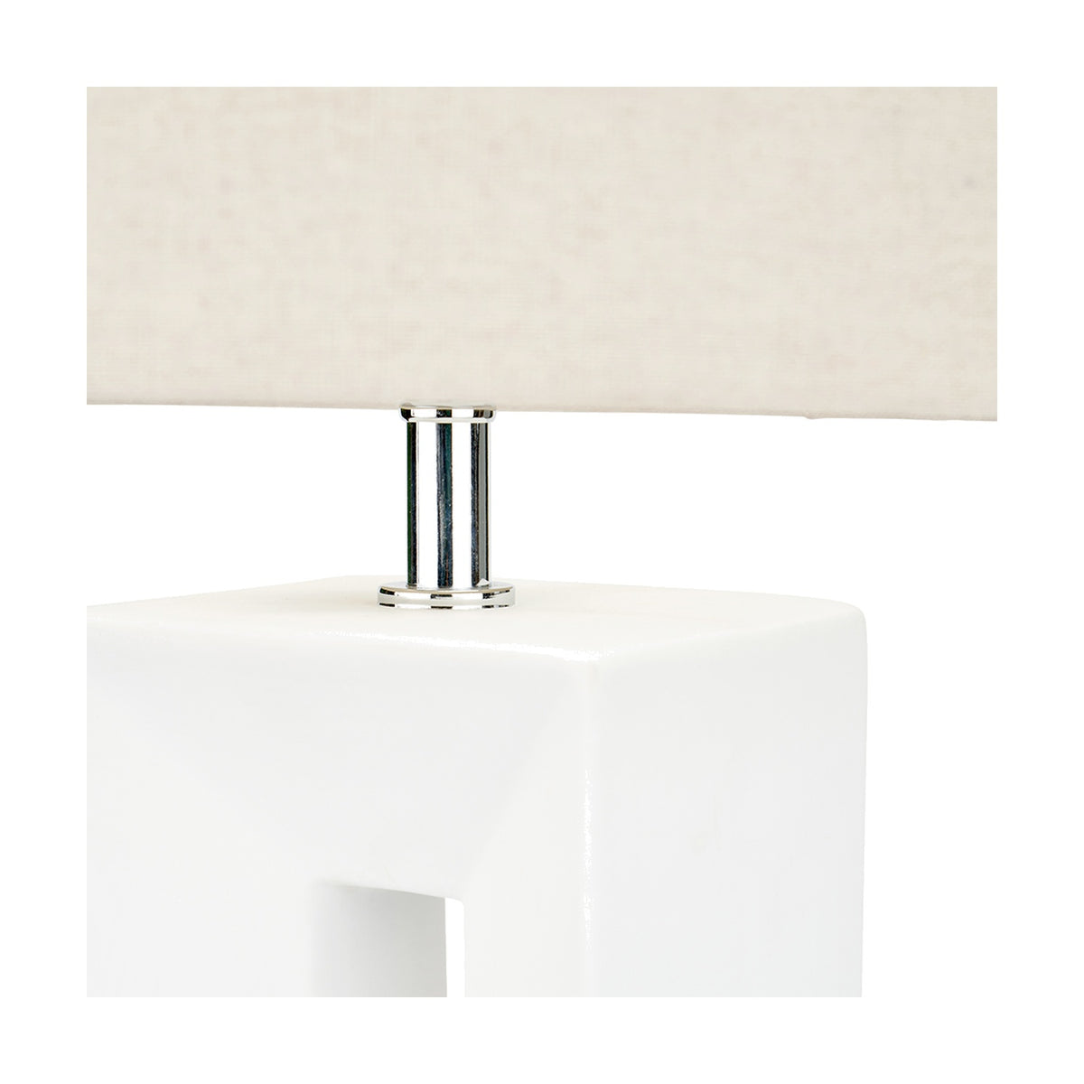 Close-up of the Block White Ceramic Tall Table Lamp showing the chrome cylindrical fitting joining the square white ceramic base to a rectangular linen shade.