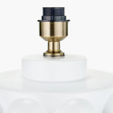 Close-up of the Serenity White Bobbled Ceramic Large Table Lamp Base showing the antique brass fitting and lamp holder atop the white ceramic base, on a plain background.