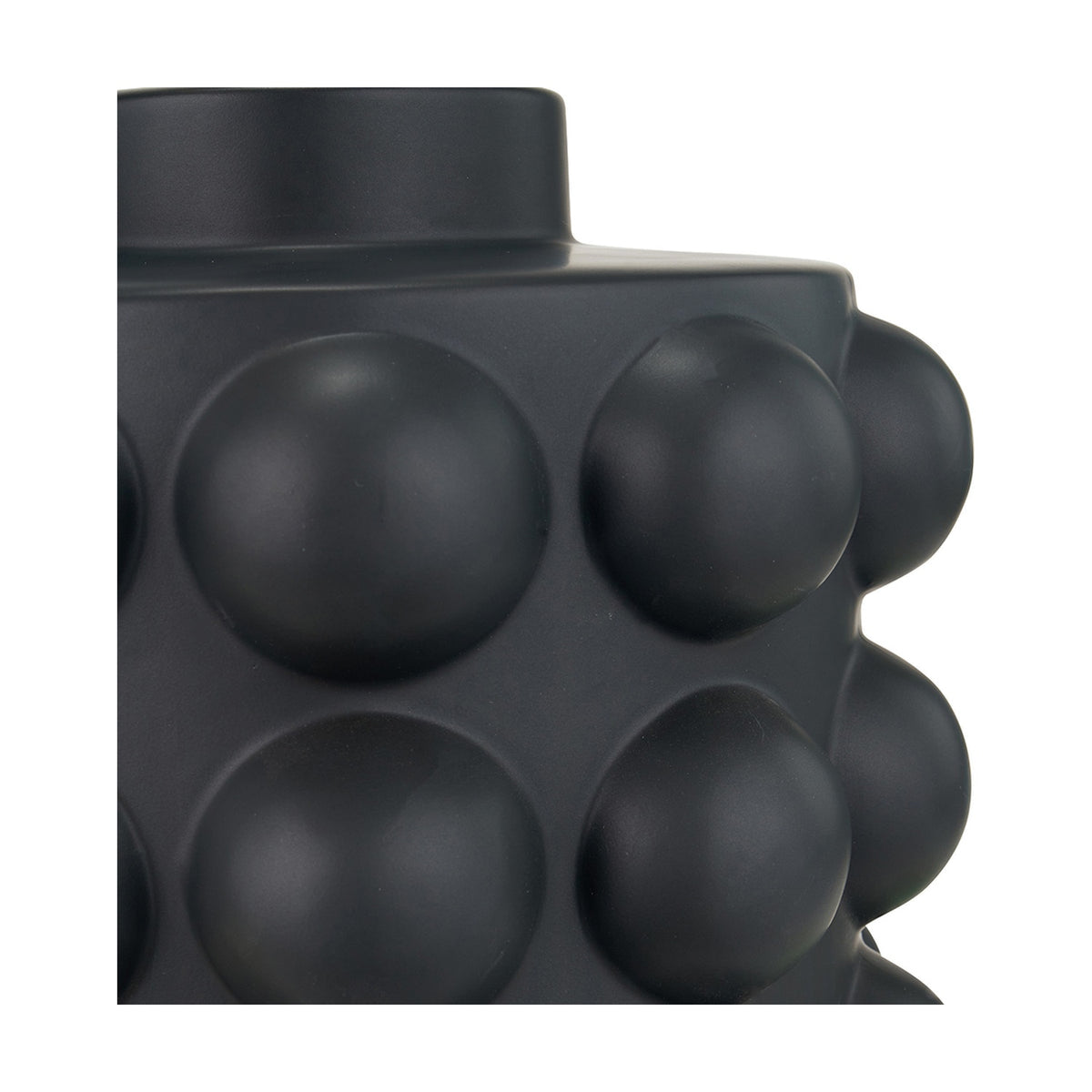 Close-up of the Serenity Black Bobbled Ceramic Large Table Lamp Base, 36cm, showing raised spherical bobbles and a matte black finish on a plain white background.