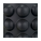 Close-up of the Serenity Black Bobbled Ceramic Large Table Lamp Base, 36cm, showing its matte black textured surface with a raised spherical bobble pattern.