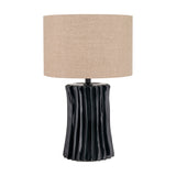 Devony table lamp with a black pleated ceramic base, 38cm tall, and a round beige fabric drum shade, shown on a plain white background.