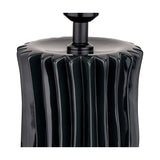 Close-up of the Devony Black Pleated Ceramic Table Lamp Base, showing the ridged column texture and black fitting, set against a plain white background.