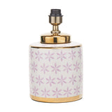 Thea ceramic table lamp base, 33cm, white body with lilac floral pattern and gold banded neck and base, antique brass fitting, plain white background.