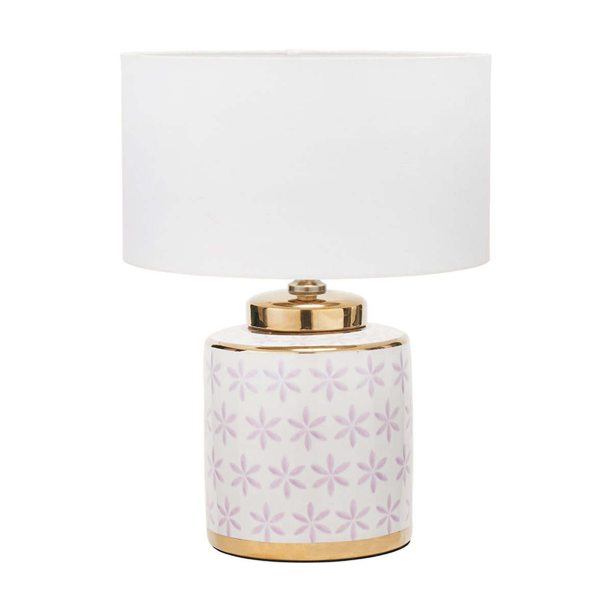 Thea table lamp with a white drum shade on a ceramic base featuring a lilac floral pattern and gold accents, shown on a plain white background.