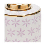 Close-up of the Thea Lilac & Gold Leaf Ceramic Table Lamp Base showing a gold neck fitting above a white ceramic body patterned with lilac star-flower motifs.