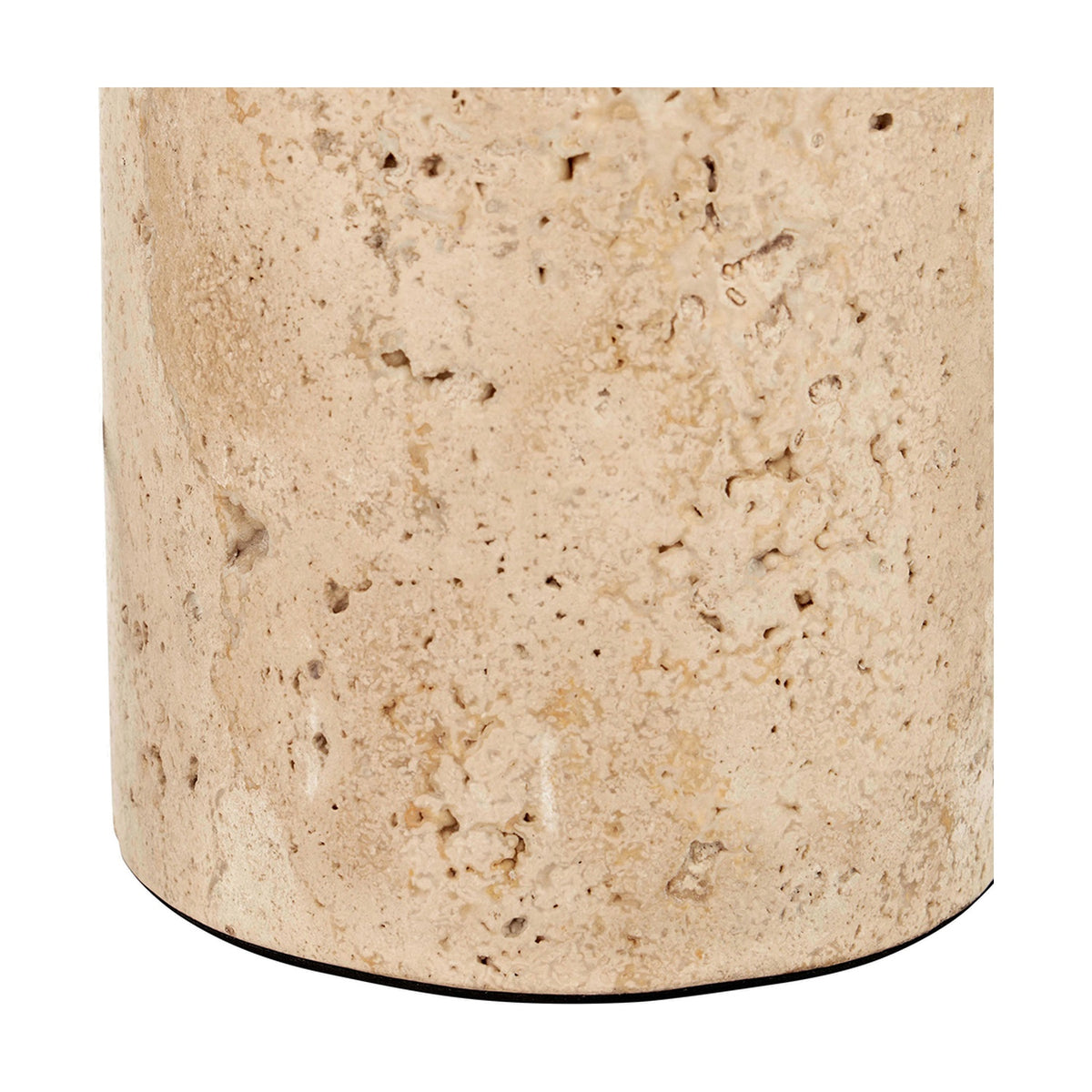 Close-up of the Kanoa Limestone Cylinder Table Lamp base, showing its natural textured stone surface in beige tones on a plain white background.