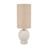 Althea Sandstone Table Lamp, 48cm, with a round sand-coloured base and tall cylindrical natural linen shade, set against a plain white background.
