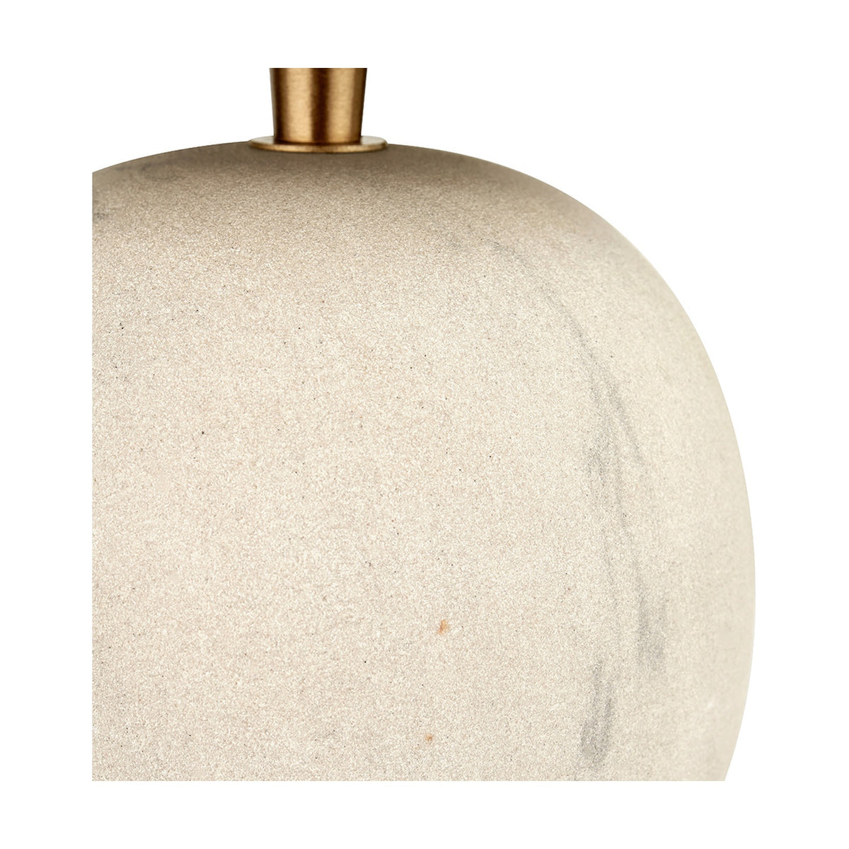 Close-up of the Althea Sandstone Table Lamp's rounded sand-coloured ceramic base with a brushed brass neck fitting, shown against a plain white background.