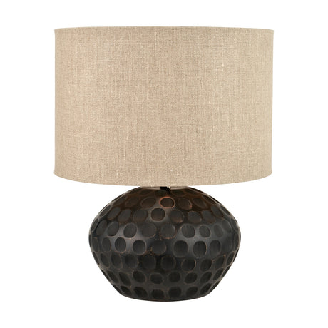 Dante Antique Black Mango Table Lamp, 42cm, with a rounded dimpled dark wood base and cylindrical natural linen drum shade, shown against a plain white background.