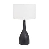 Corella Black Mango Curved Table Lamp Base, 54cm, with a bottle-shaped wood base and white drum shade, shown on a plain white background.