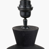 Close-up of the Koa Black Mango table lamp base, showing the black metal fitting and lamp holder atop a tapered black wood body, on a plain background.