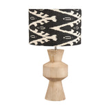 Koa Mango Contemporary Table Lamp Base, 43cm, with sculptural stacked wood forms in natural finish, shown with a black and cream ikat-patterned drum shade on a white background.