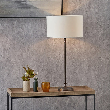Piero Bronze Candlestick Table Lamp with White Handloom Cylinder Shade