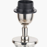 Elysia table lamp base close-up showing the brushed silver socket fitting with black bulb holder and threaded neck above a curved metal stem and bubble glass base, on a plain white background.
