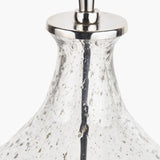 Close-up of the Elysia table lamp base showing bubble-textured glass with a dark central seam and brushed silver metal cap, on a plain white background.